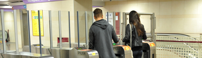 Image of passengers stamping tickets